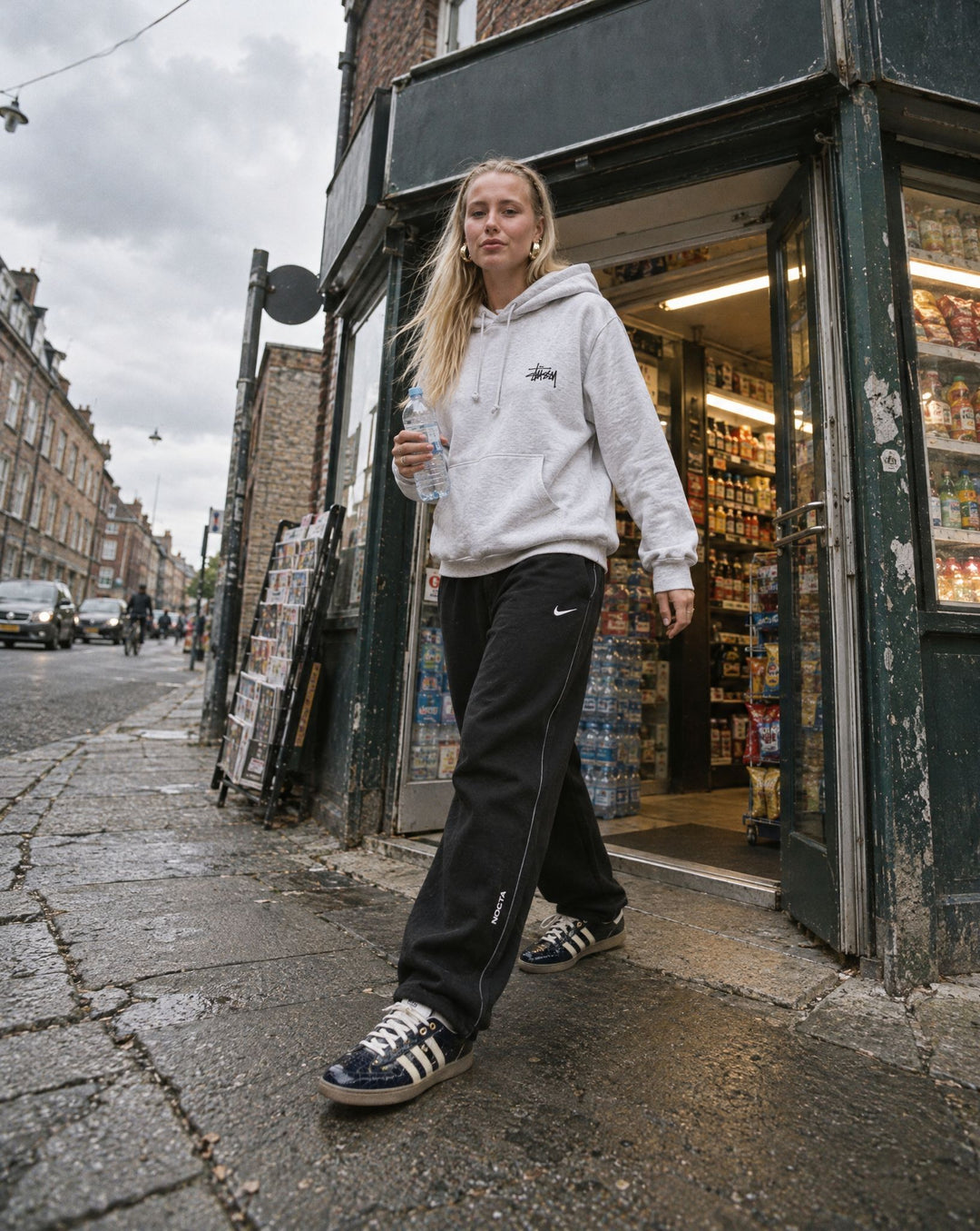Stussy Basic Hoodie Ash Heather, Nike x NOCTA Fleece CS Open Hem Sweatpant Black, adidas Samba Wales Bonner Navy Croc